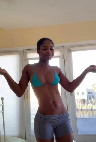 4. Luscious Angel Ogbonna Shows Cleavage in Blue Bikini Top