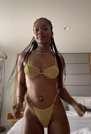 2. Sexy Angel Ogbonna in Golden Bikini