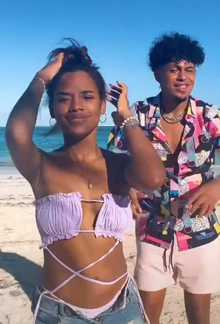 Sultry Ashley Montero in Purple Bikini Top at the Beach