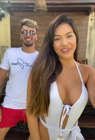 5. Sexy Ayarla Souza Shows Cleavage in White Swimsuit