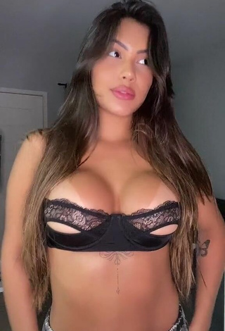 Titillating Ayarla Souza Shows Cleavage in Black Bra