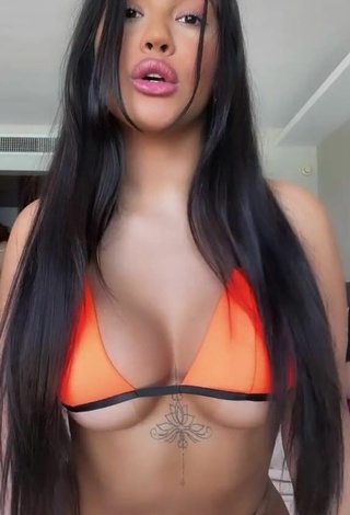 5. Sultry Ayarla Souza Shows Cleavage in Orange Bikini Top (Underboob)