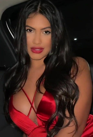 3. Sultry Ayarla Souza in Red Dress