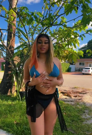 Luscious BbygShai Shows Cleavage in Blue Bikini