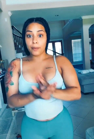 5. Titillating Carmen Pritchett Shows Cleavage in Grey Top and Bouncing Boobs