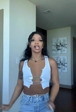 2. Sultry De'arra Taylor in White Crop Top